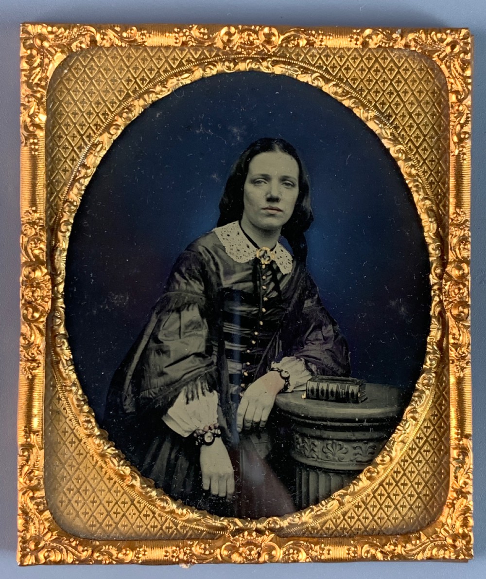 Victorian hand tinted ambrotype portrait of a young girl