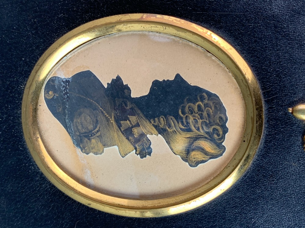 Regency cut silhouette of a lady with bronze highlights in a Wm Hill frame View II