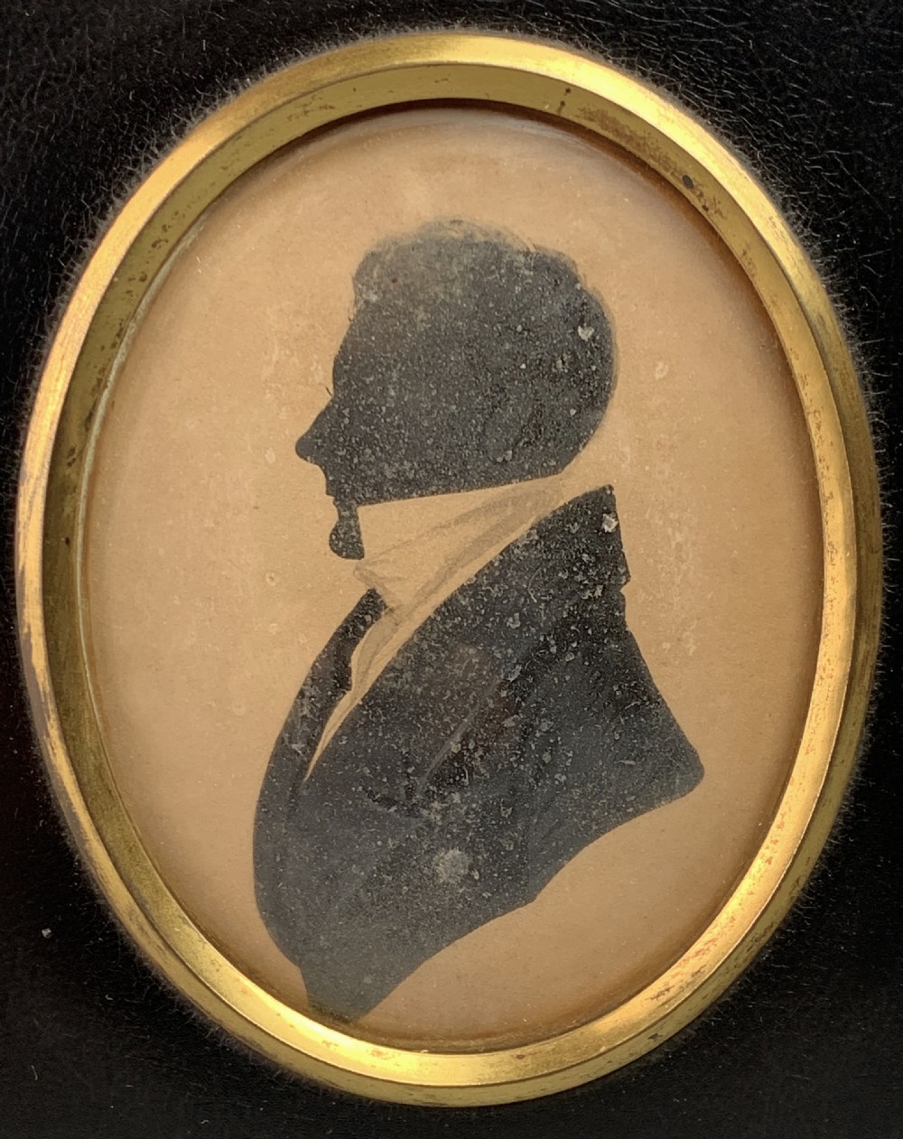 Pair of Regency cut paper silhouettes of a lady and gentleman with painted highlights View II
