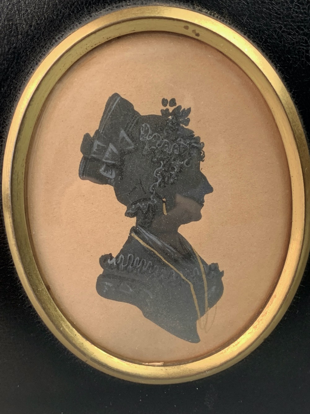 Pair of Regency cut paper silhouettes of a lady and gentleman with painted highlights View III