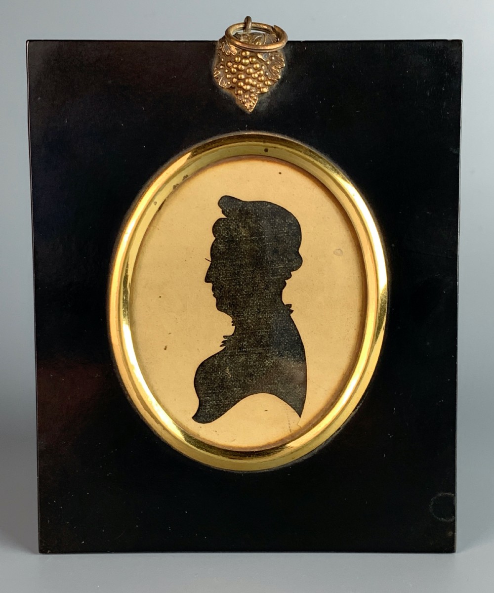 Regency reverse cut paper silhouette of a lady in profile