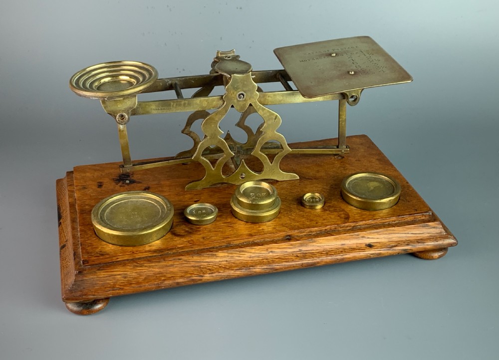 Set of Thornill brass postal scales, circa 1900, with weights View V