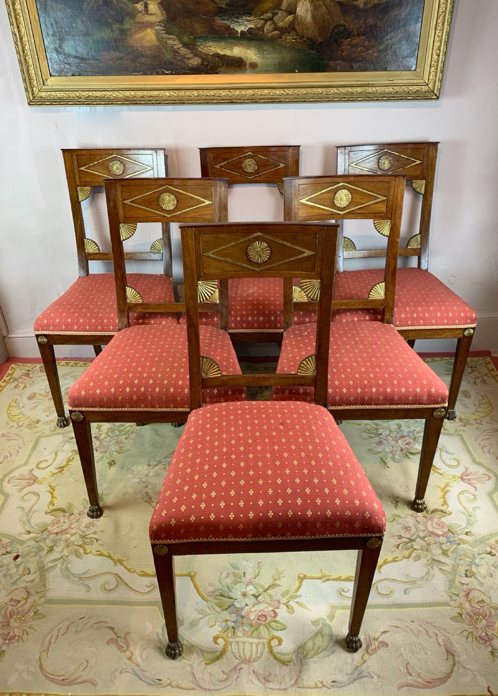 Set of six Biedermeier dining chairs with gilt paw feet