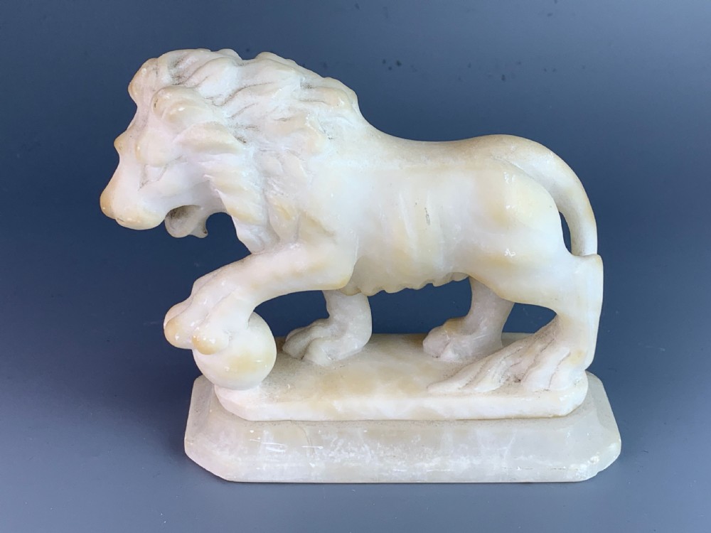 Pair of Grand Tour carved alabaster Medici lions View III