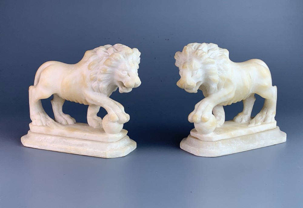 Pair of Grand Tour carved alabaster Medici lions View IV