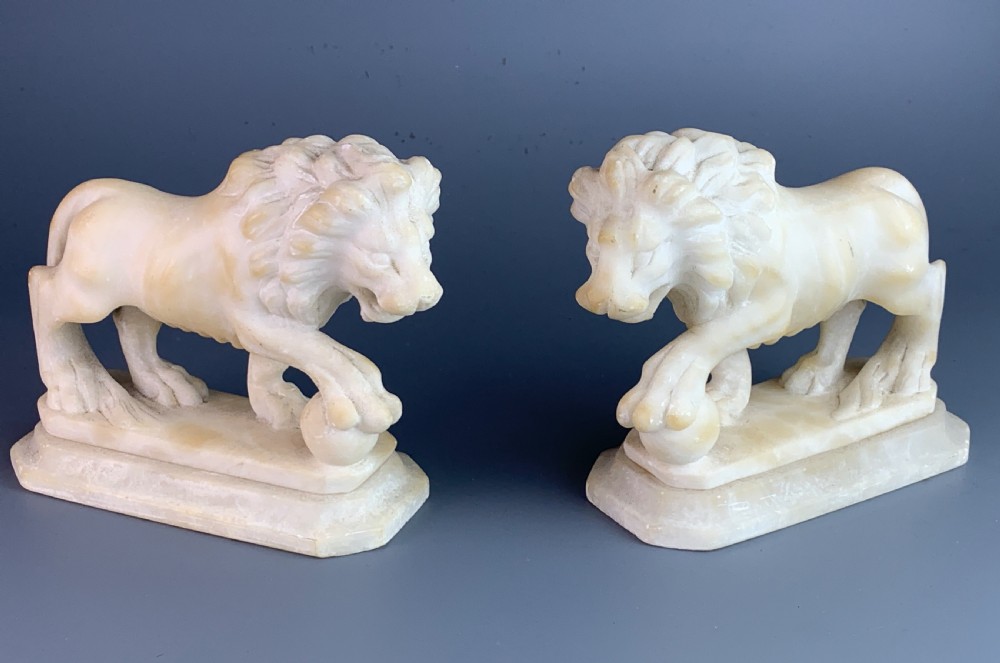 Pair of Grand Tour carved alabaster Medici lions View V