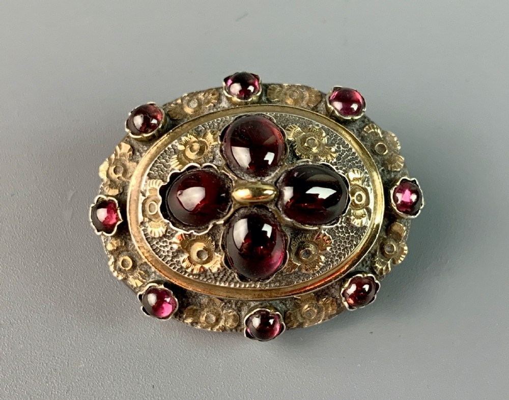 Victorian garnet set foliate cast brooch