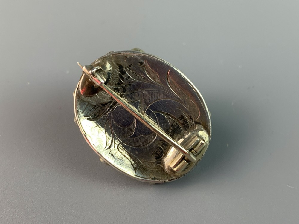 Victorian garnet set foliate cast brooch View II