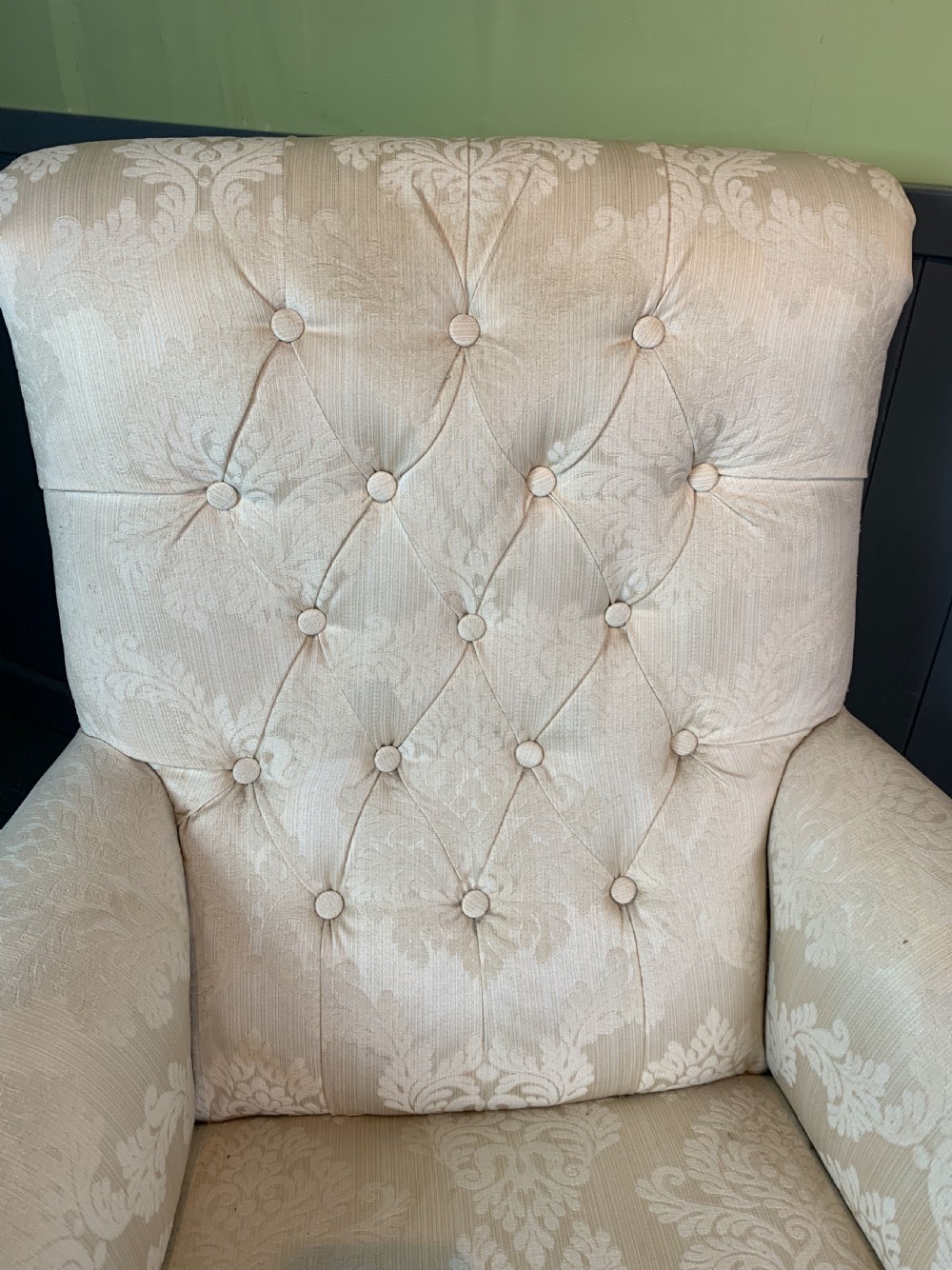 Deep seated Victorian button back armchair of country house proportions View III
