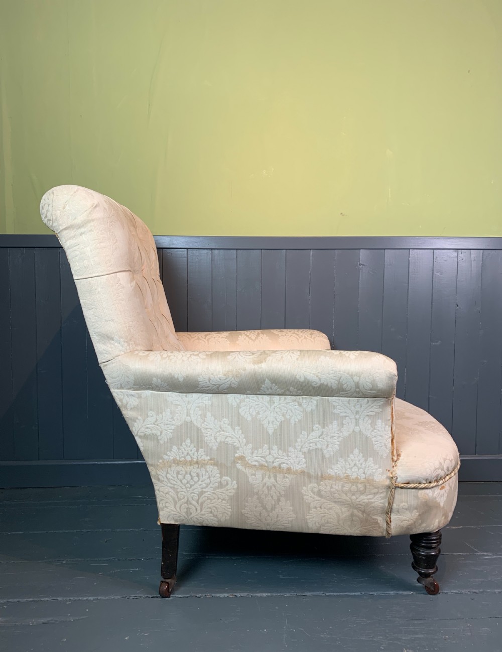 Deep seated Victorian button back armchair of country house proportions View IV