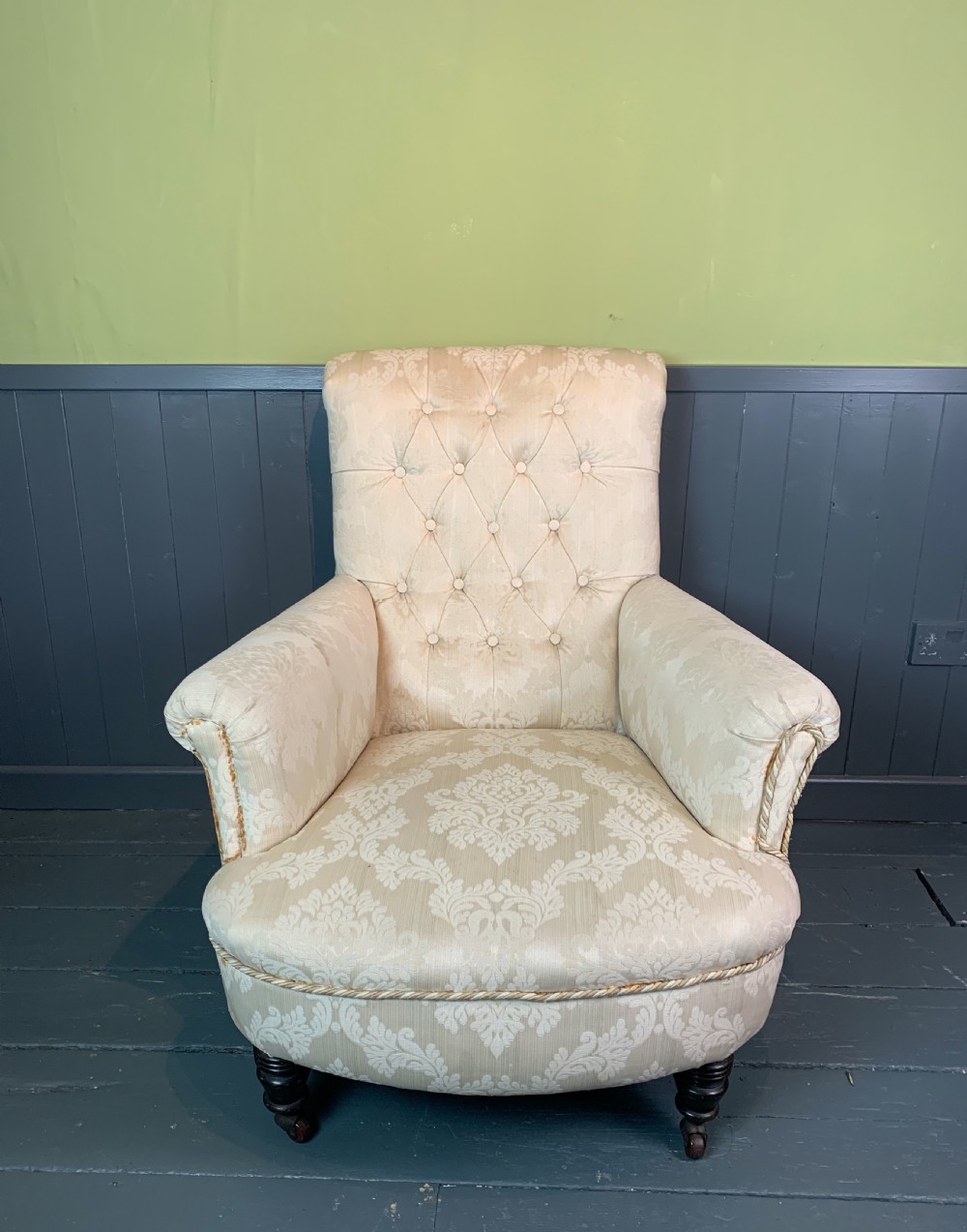 Deep seated Victorian button back armchair of country house proportions View V