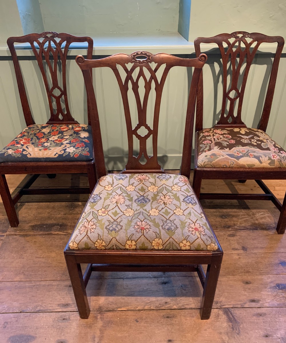 Set of Twelve Georgian mahogany dining chairs of Chippendale design View III