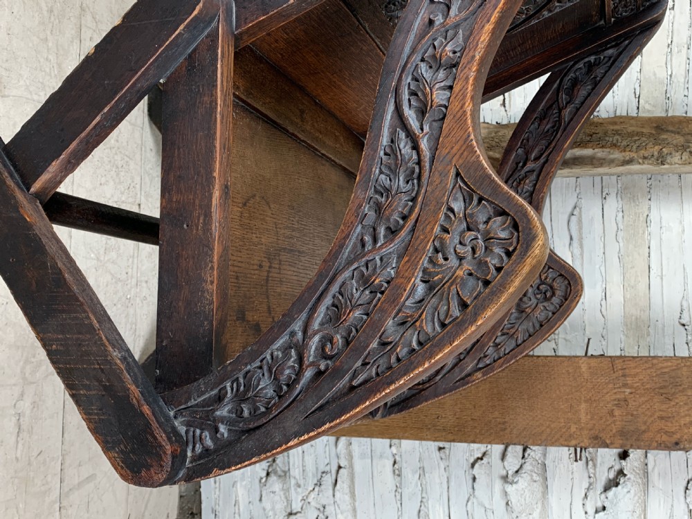 Victorian oak Glastonbury chair carved with the Crown of Thorns View III