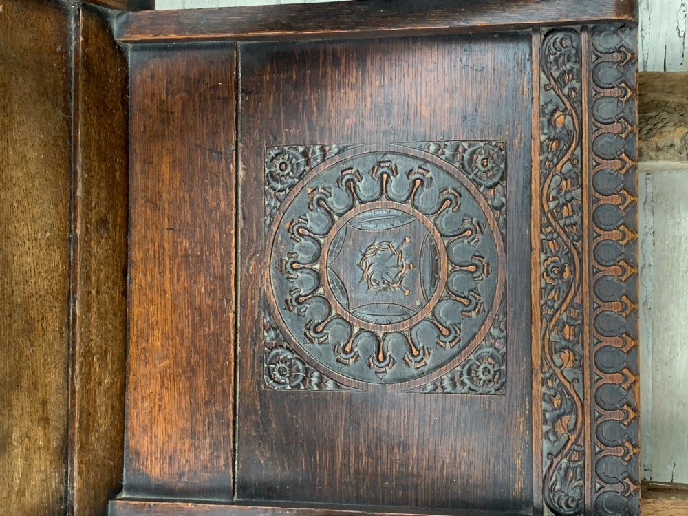 Victorian oak Glastonbury chair carved with the Crown of Thorns View IV