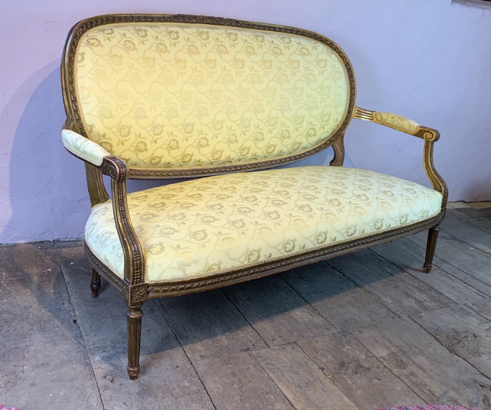 Antique French Louis XVI revival giltwood sofa View II