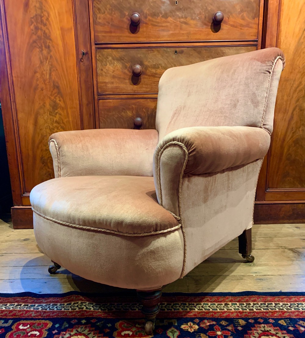 Antique Victorian deep seated armchair of good proportions View III