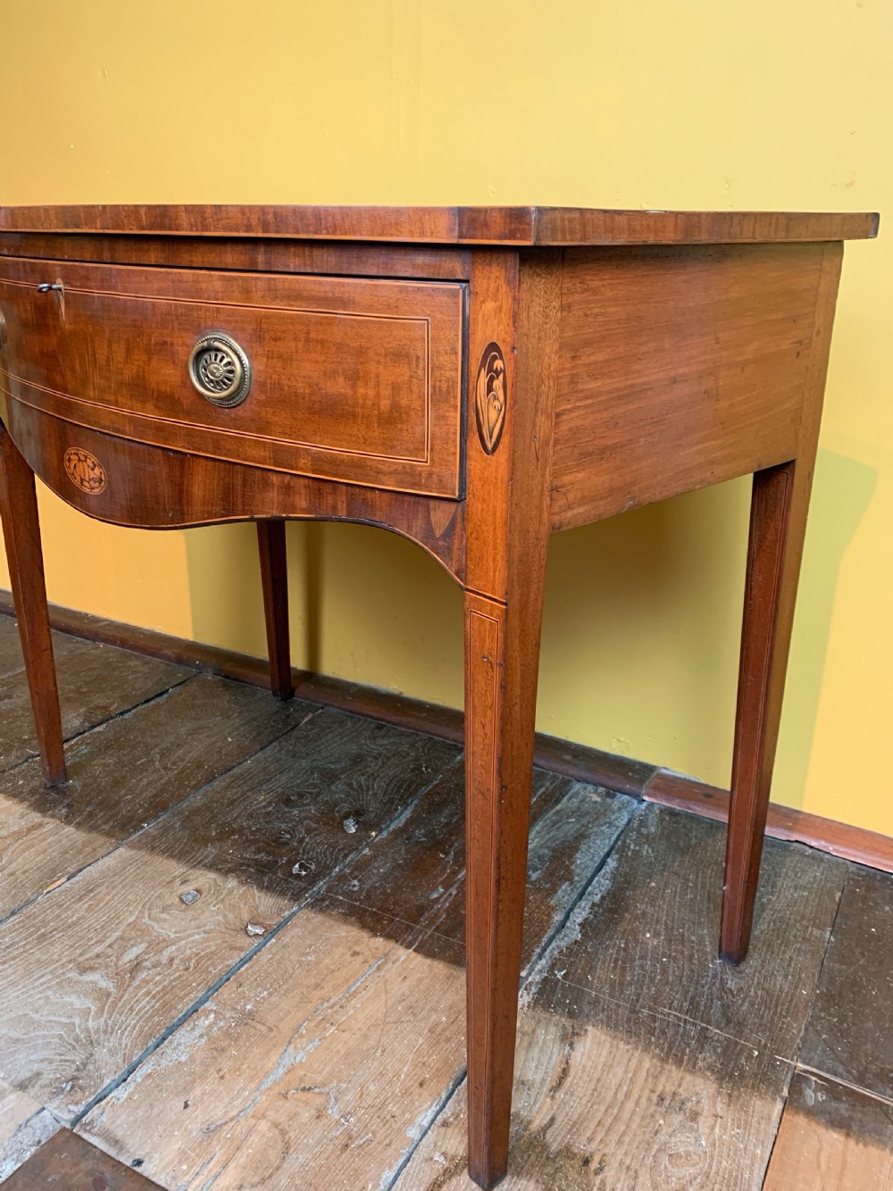 Georgian inlaid mahogany bowfront side table with single frieze drawer View V