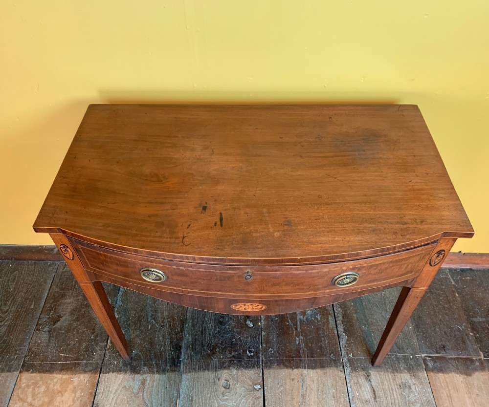 Georgian inlaid mahogany bowfront side table with single frieze drawer View VI