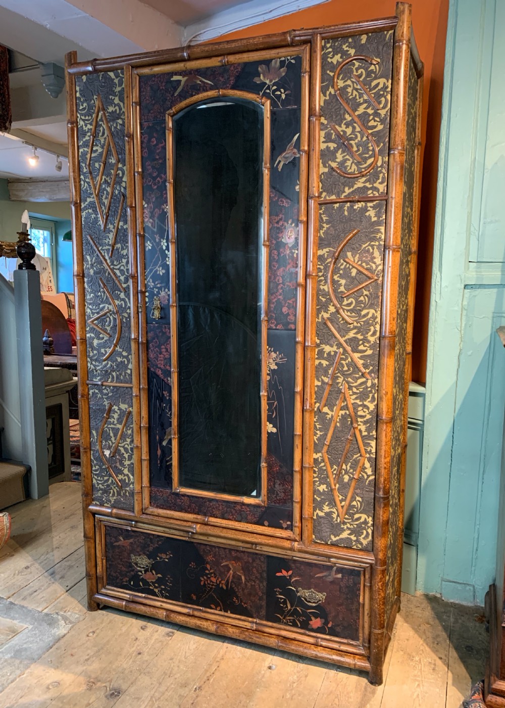 Victorian Aesthetic Movement bamboo and lacquer panelled wardrobe