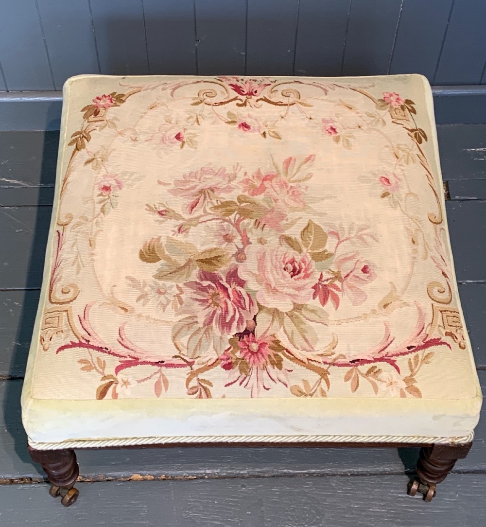 Victorian Aubusson tapestry upholstered stool with Harrington's Patent castors View II