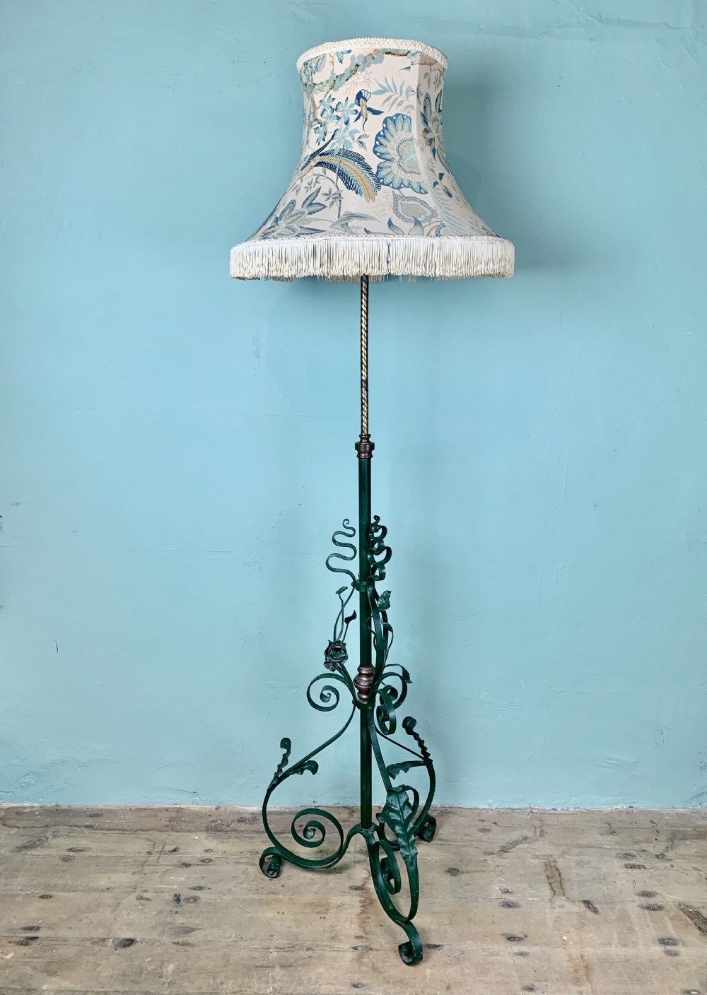Victorian green painted wrought iron and brass adjustable standard lamp