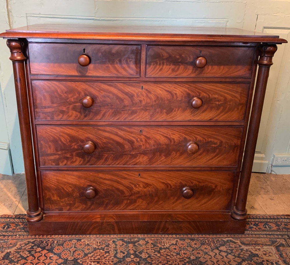 Victorian figured mahogany chest of drawers with column corners View II