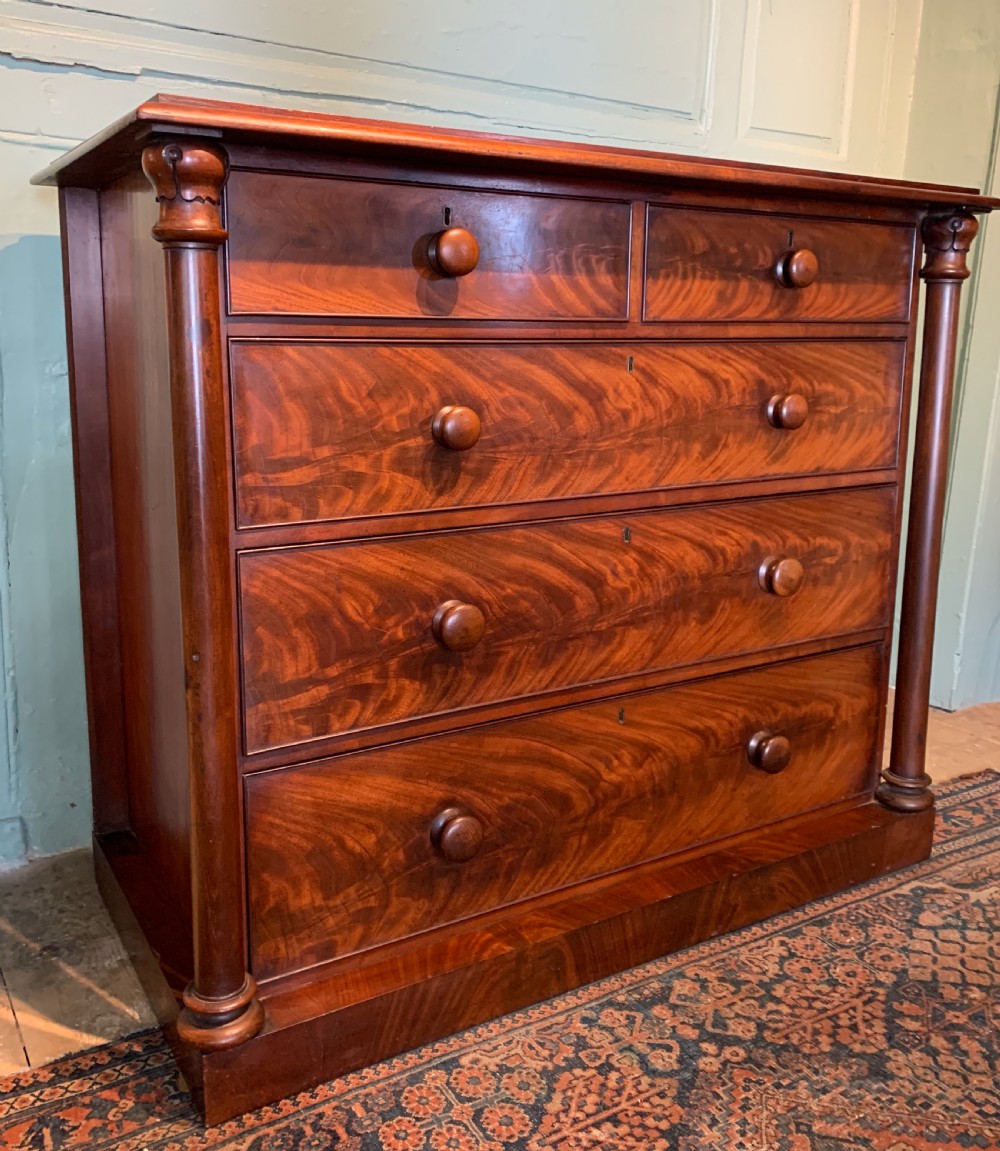 Victorian figured mahogany chest of drawers with column corners View III