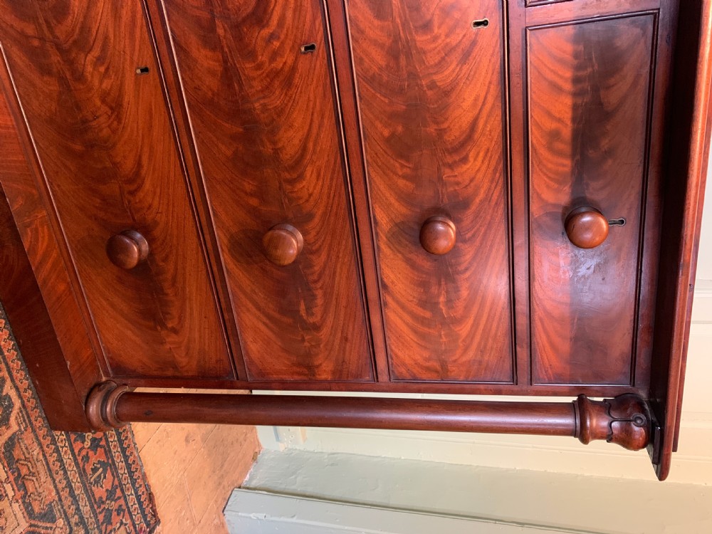 Victorian figured mahogany chest of drawers with column corners View IV