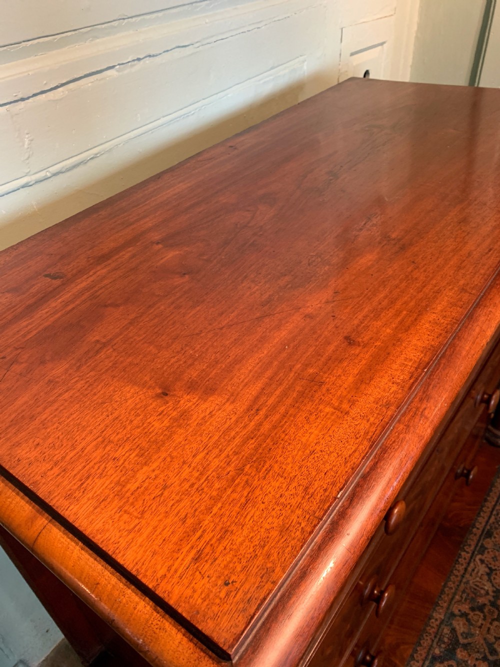 Victorian figured mahogany chest of drawers with column corners View VII