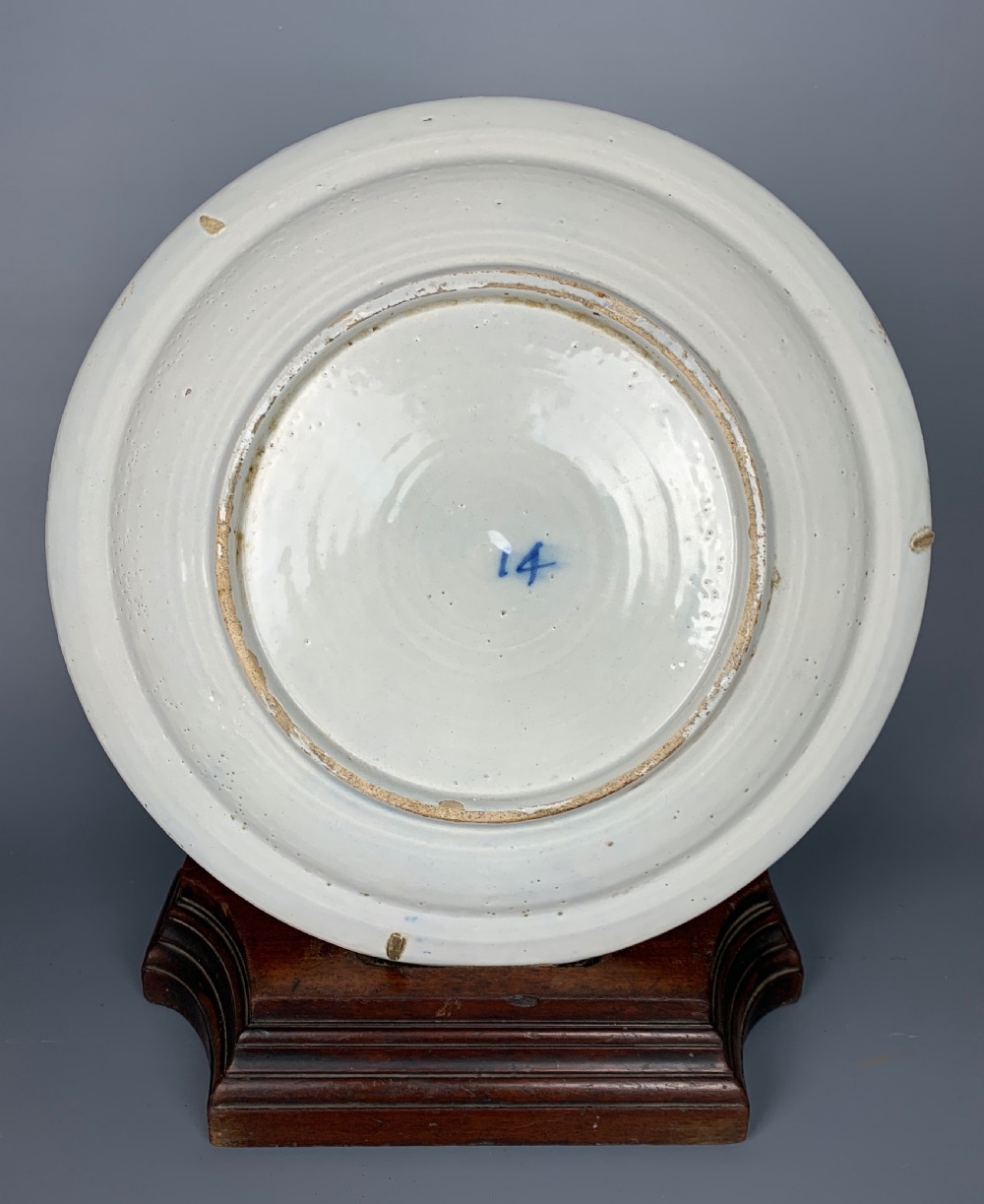 18th century Delft blue & white charger painted with tulips and a water bird View II