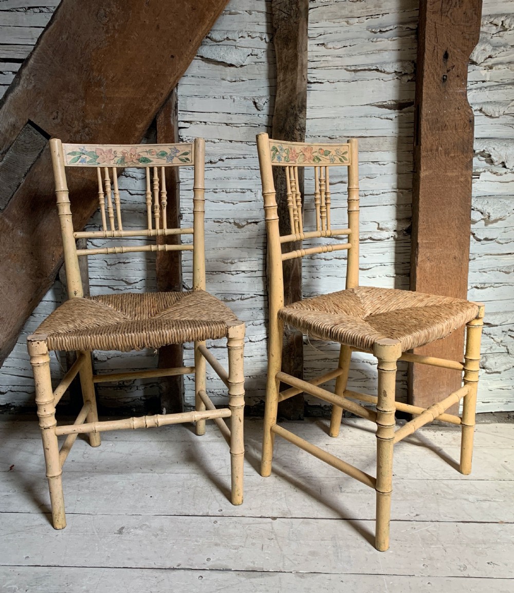 Pair of Regency painted  faux bamboo rush seated chairs View V