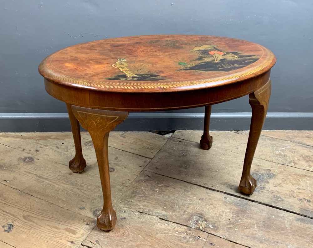 Chinoiserie decorated oval mahogany coffee table