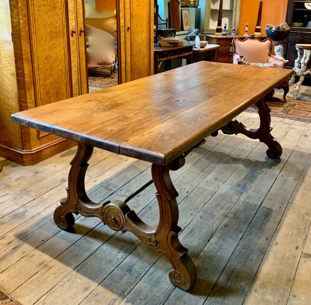 Spanish oak refectory dining table with iron stretchers View II