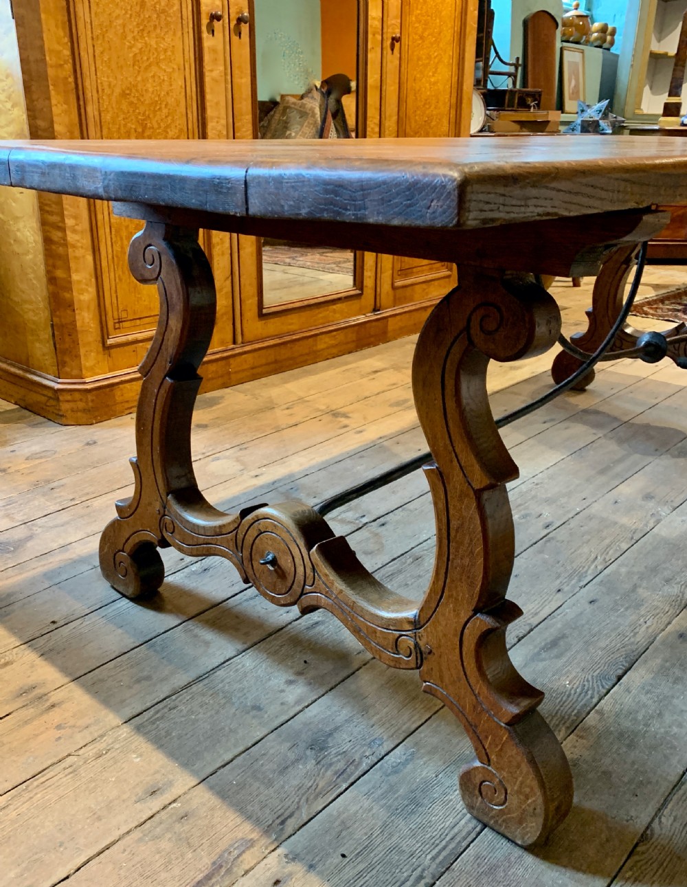 Spanish oak refectory dining table with iron stretchers View V
