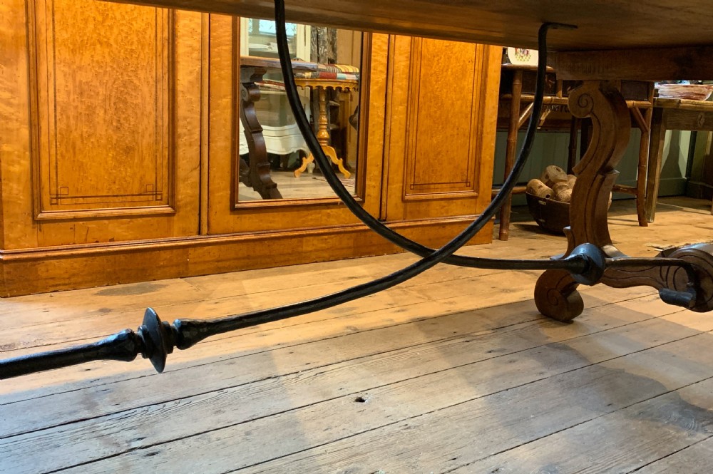 Spanish oak refectory dining table with iron stretchers View VII
