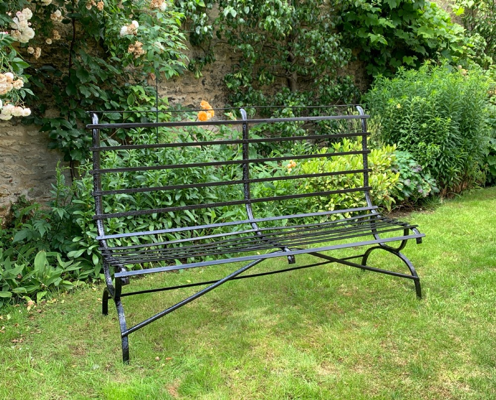 Edwardian wrought iron strap-work garden bench View II