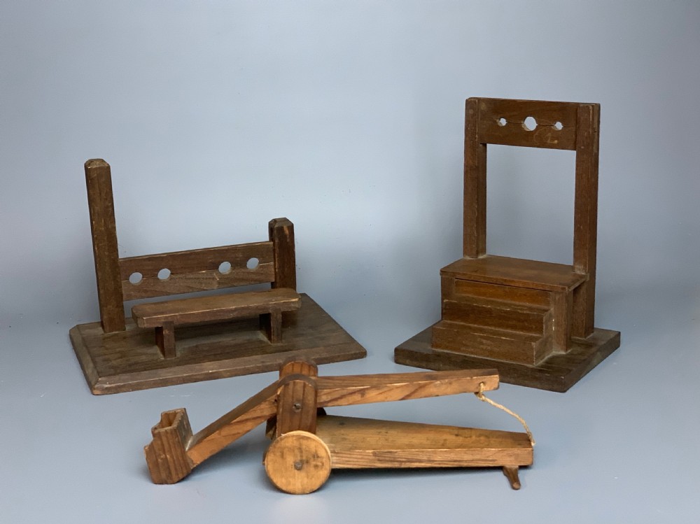 Naive scratch build wooden models of instruments of punishment View II