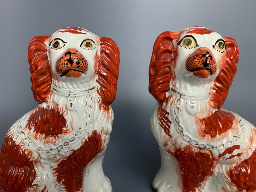 Pair of Victorian Staffordshire pottery white and tan spaniels dogs View II