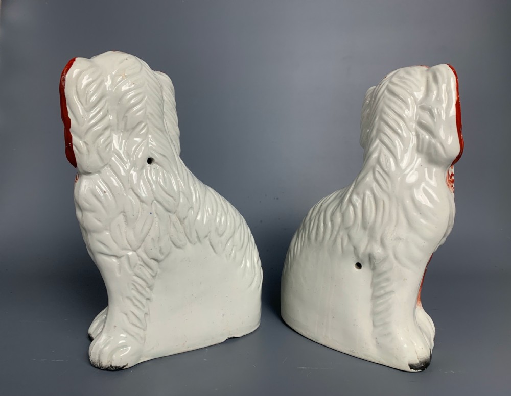 Pair of Victorian Staffordshire pottery white and tan spaniels dogs View III