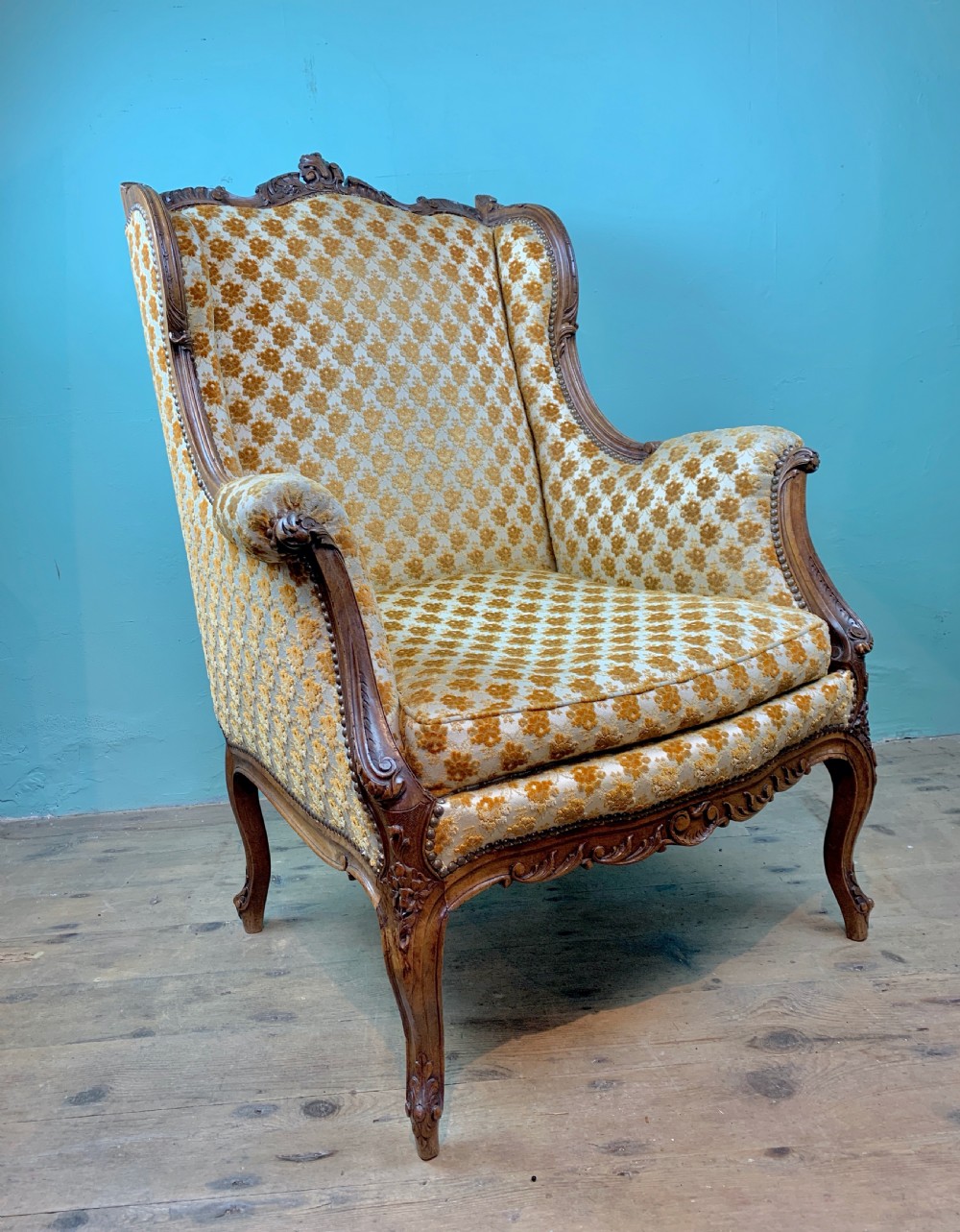 Antique French Louis XV revival wingback armchair of generous proportions View II