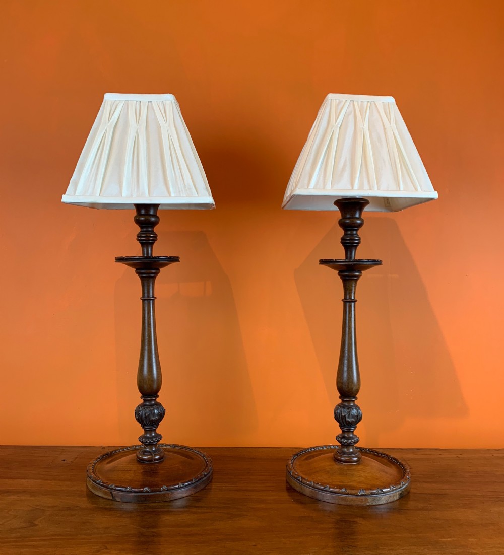 Pair of Georgian style turned mahogany table lamps