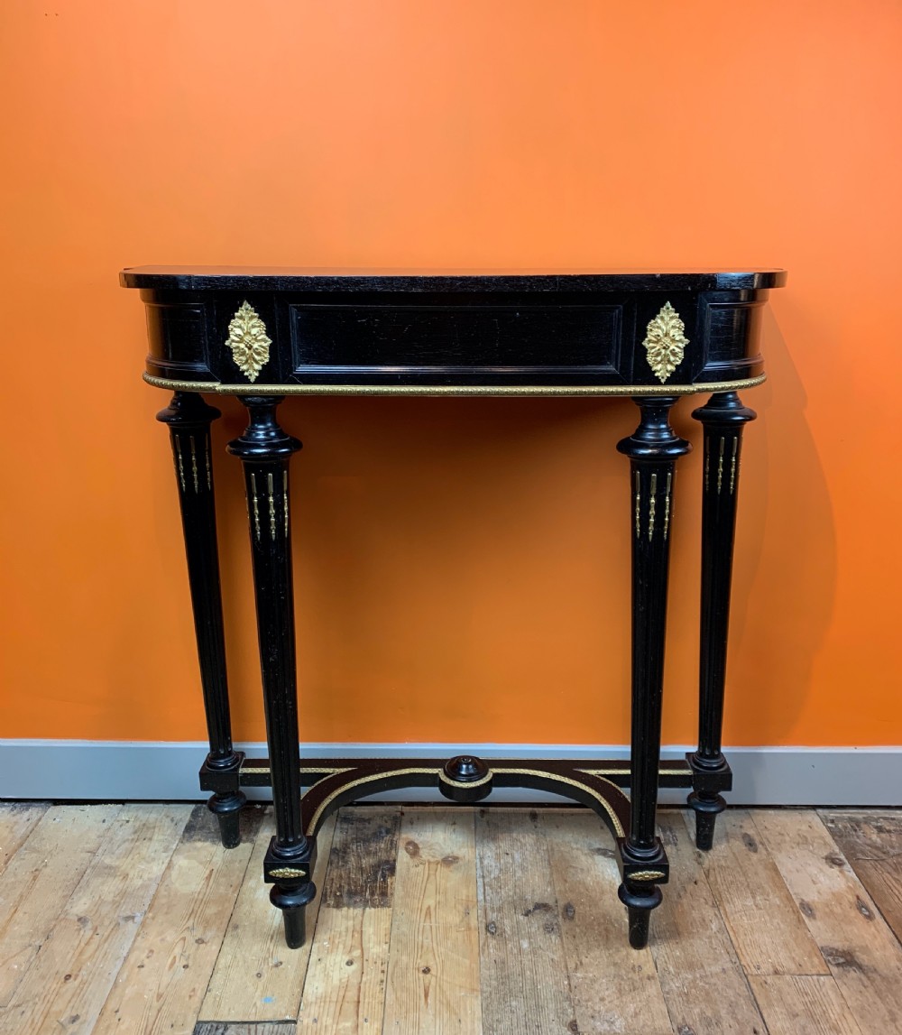 Antique French ebonised & gilt metal mounted console table View II