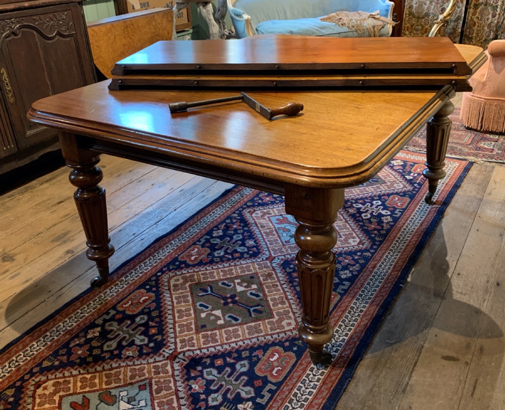 Victorian mahogany extending dining table with 2 additional leaves View III