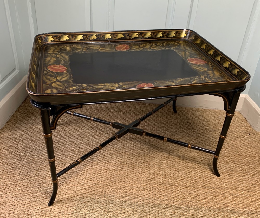 Large Regency papier mache tray upon later faux bamboo stand