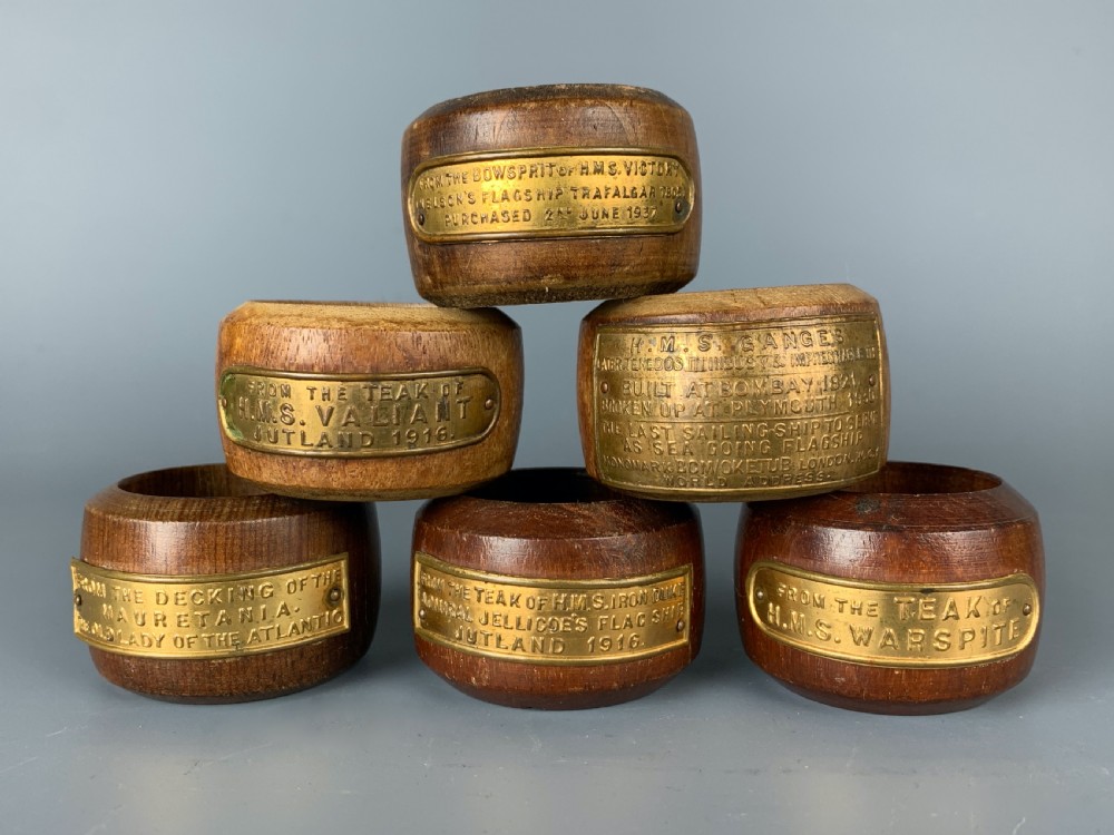 Six teak napkin rings of Naval interest - Nelson's HM Victory