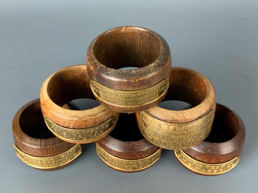 Six teak napkin rings of Naval interest - Nelson's HM Victory View IV