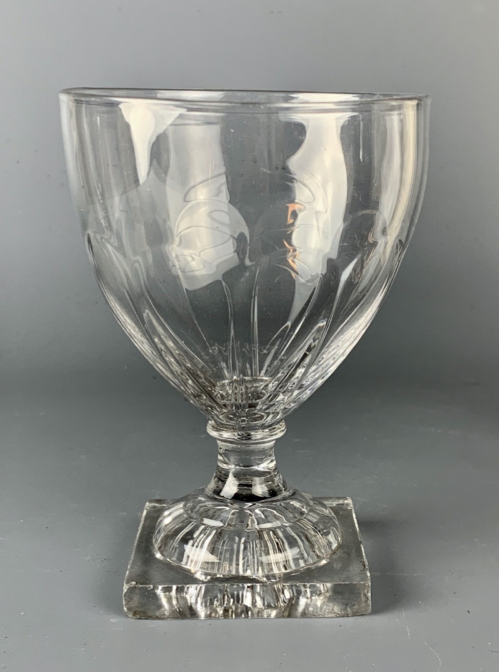Regency panel moulded glass rummer with lemon squeezer foot