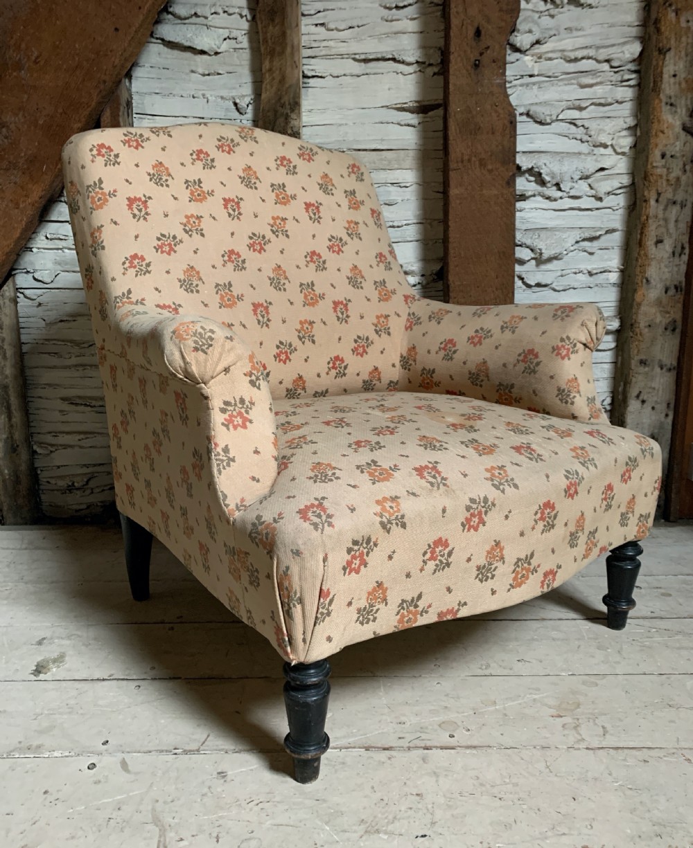 Antique French Napoleon III armchair with scroll arms