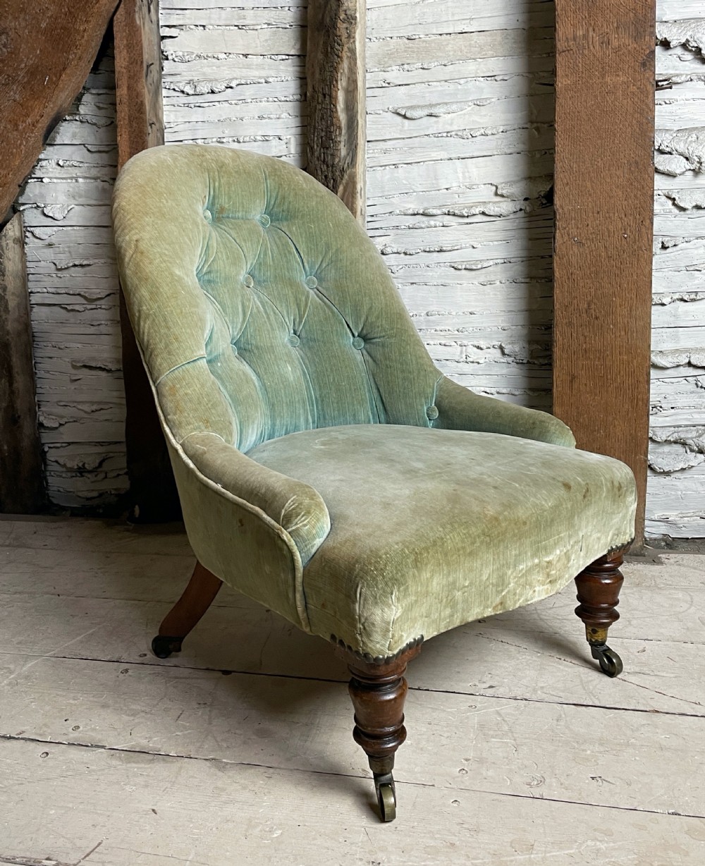 Victorian child's iron framed button back chair