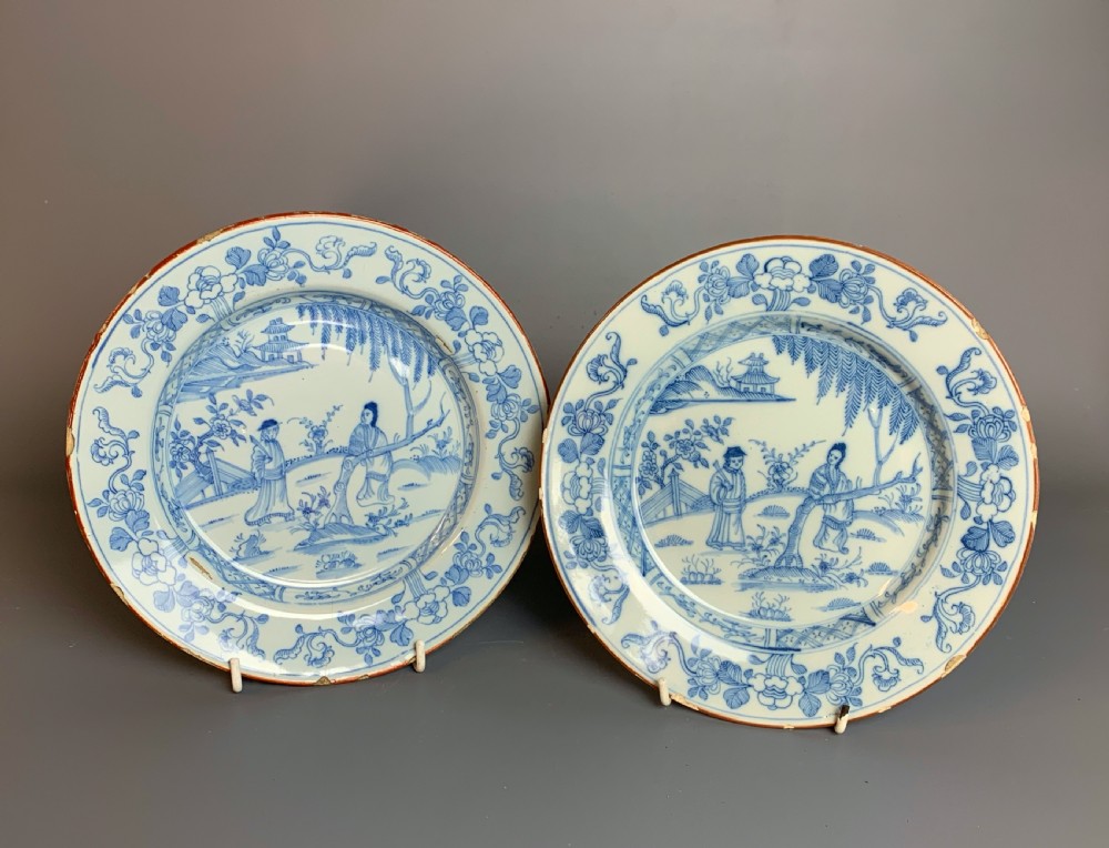 Pair of 18th century Delft blue & white plates with chinoiserie design
